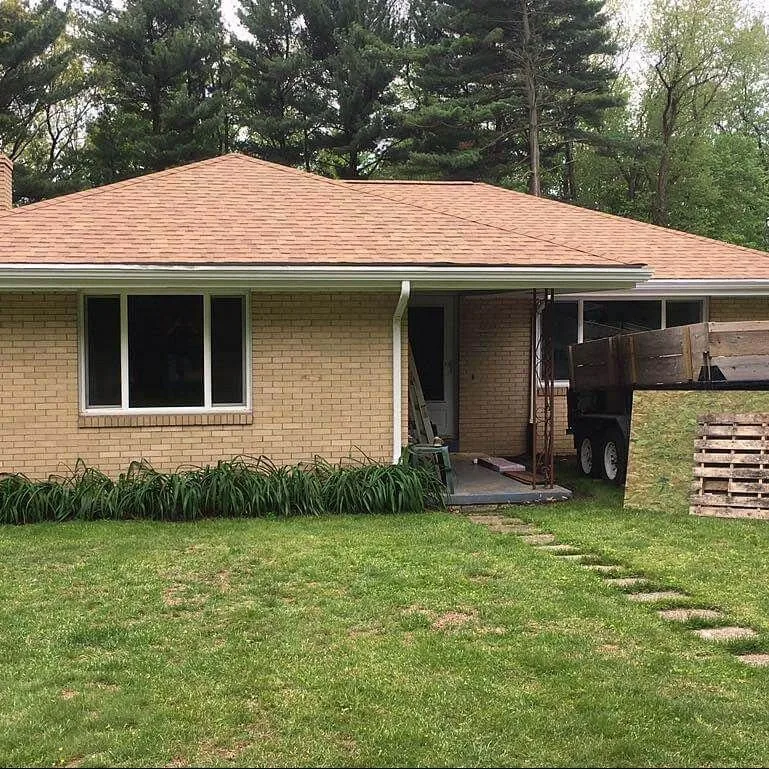 Single-story home with a tan tile-look roof completed by Ireland Contracting
